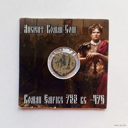 Бронзовая монета римской империи в холдере 5х5 см.