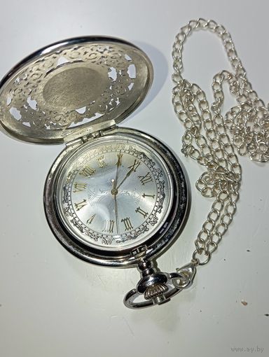 Часы кварцевые карманные .