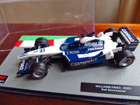 Модель автомобиля 1-43 Фомула 1 Formula 1 F1 Williams FW23 2001 Ralf Schumacher В комплекте модель, бокс, журнал Состояние модель как новая журнал отличное