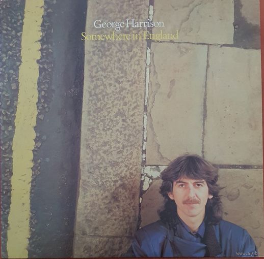 George Harrison. Somewhere in England.