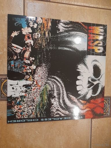 WASP " THE HEADLESS CHILDREN" 1989/?  reissue LP E.U. CAPITOL 748942-  MINT