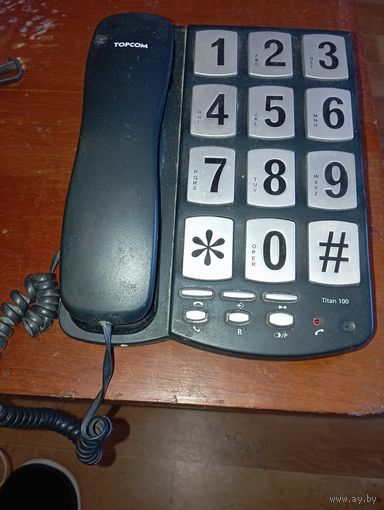 Телефон TOPCOM , с ну очень большими кнопками .