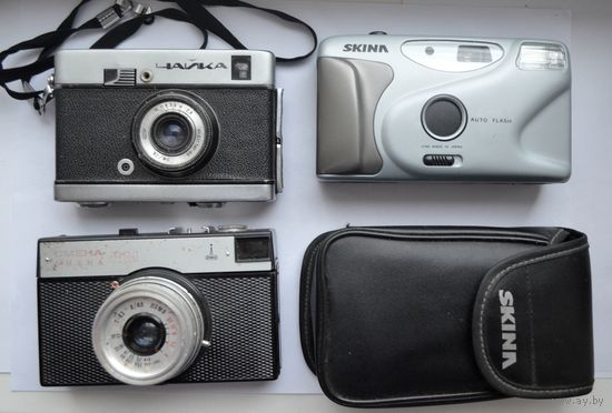 Три разных Фотоаппарата.Взводятся.Щелкают.