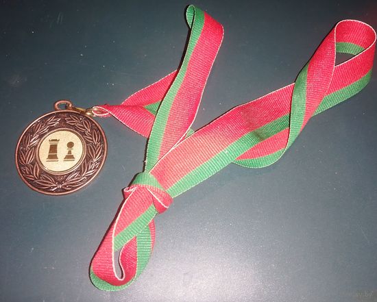 Медаль за 3 место по шахматам.