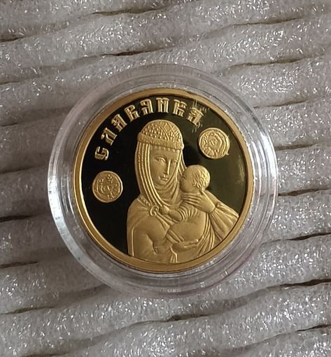 Славянка 50р, золото 999 пробы 7.78г.