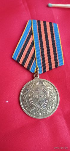 Медаль . Защитнику Отечества . Украина