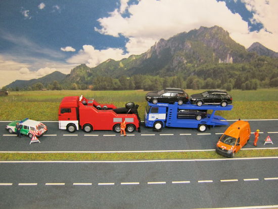 Грузовой эвакуатор MAN TG-X XLX HERPA. Масштаб НО 1:87.