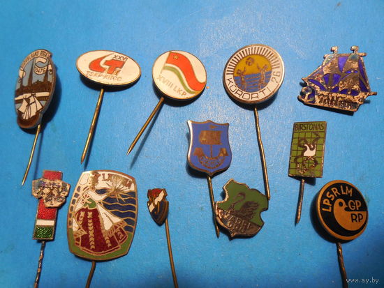 Значки.