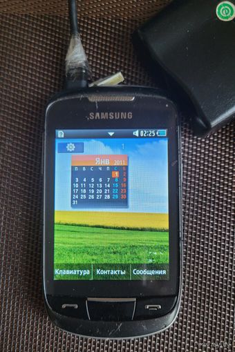Старый телефон Samsung - на запчасти.