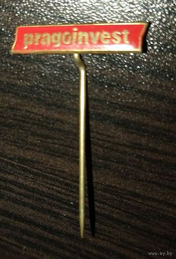 Pragoinvest. Красная эмаль, латунь, игла.