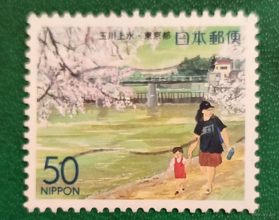 Япония 12 января 2000. Мать и ребёнок у акведука Тамагава