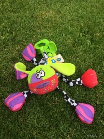 Подвесная собачка playgro, на прищепке. Игрушка целая. Есть небольшие пятнышки.