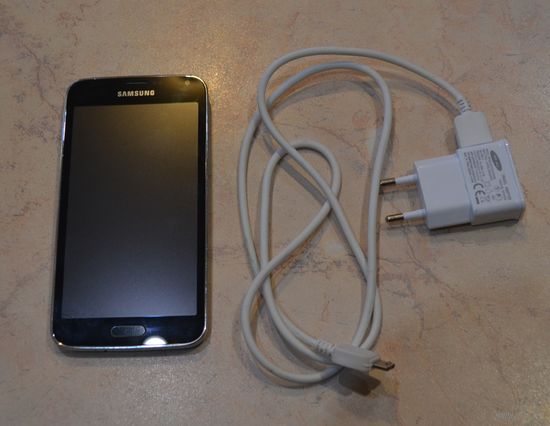 Samsung Galaxy S5 (не рабочий).