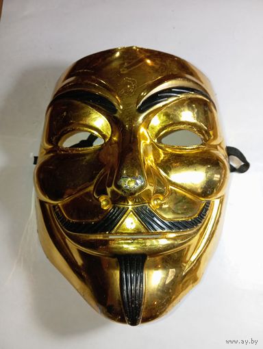 Карнавальная маска Гая Фокса (также известная как маска Анонимуса или Вендетта).