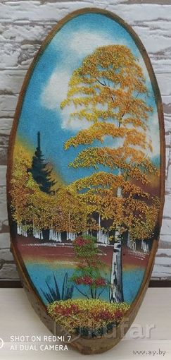 Панно на срезе дерева.