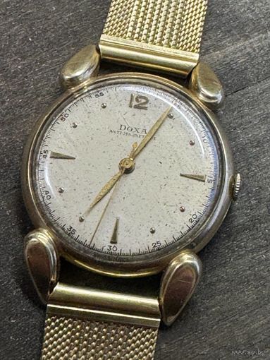 Часы 585 и браслет 750 Doxa из золота