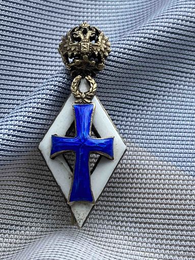 Серебряный знак за окончание Российского Государственного Университета в Санкт-Петербурге (до 1917 года)