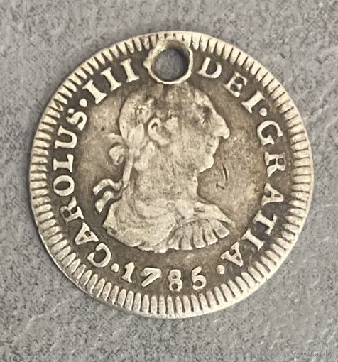 Монета 1/2 Реала 1785 год. Мексика. Карл III. Испанская колония.