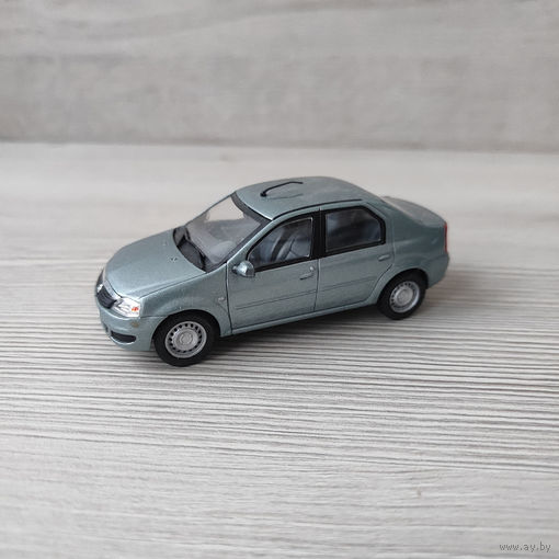 Рено логан renault logan eligor 1:43