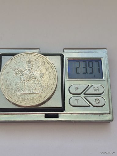 1 доллар Канада 1973 года, Королева Елизавета II (1953 - 2025). 100 лет конной полиции Канады. Серебро 500. Монета не чищена. В45510