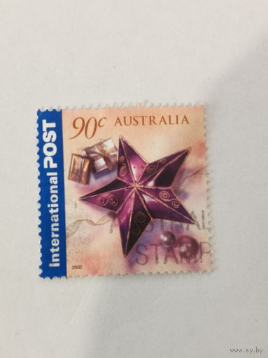 Марка из серии "Международные приветствия" - Звезда с подарками