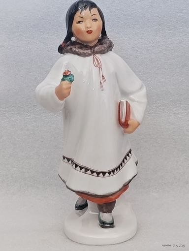 Девочка .Якутка с книгой и цветком.