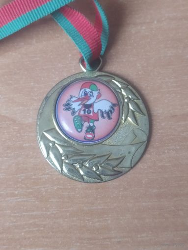 Медаль по бегу.