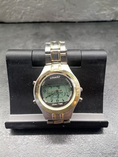 Часы sharp