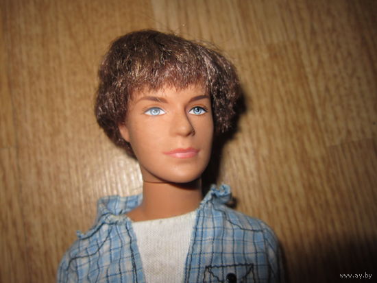 Кен . Mattel