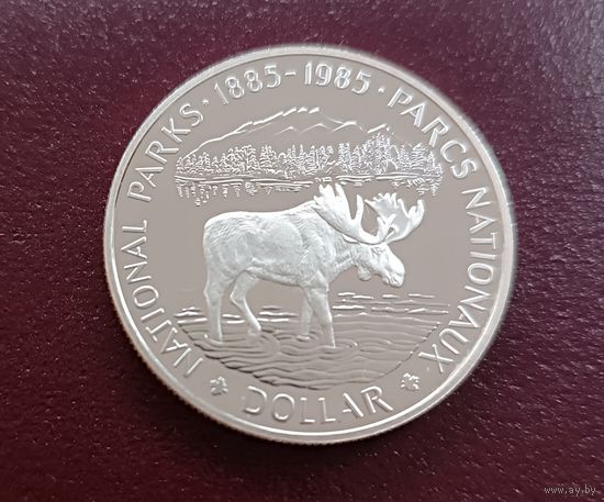Канада.1 доллар 1985г.100 лет Национальным паркам.