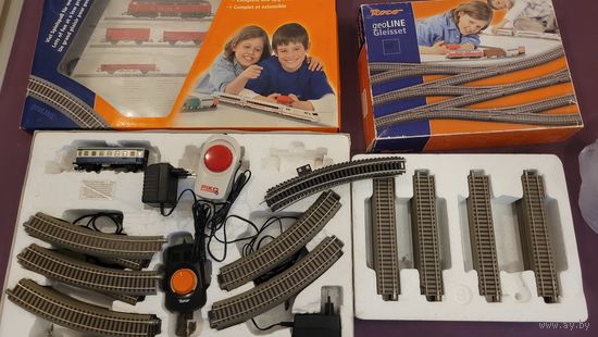 Железная дорога Roco. Рельсовый состав на подложке из 2 наборов + вагон, 2 пульта. масштаб N0